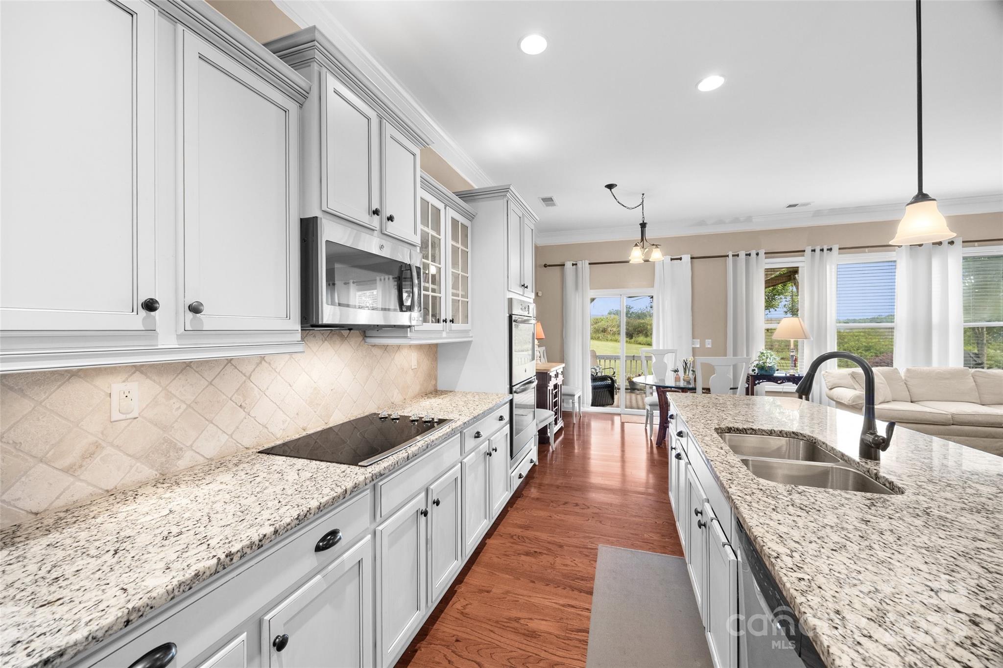 1617 Fig Branch Road Clover, SC 29710 - Photo 18 of 33 a kitchen with granite countertop a sink and cabinets