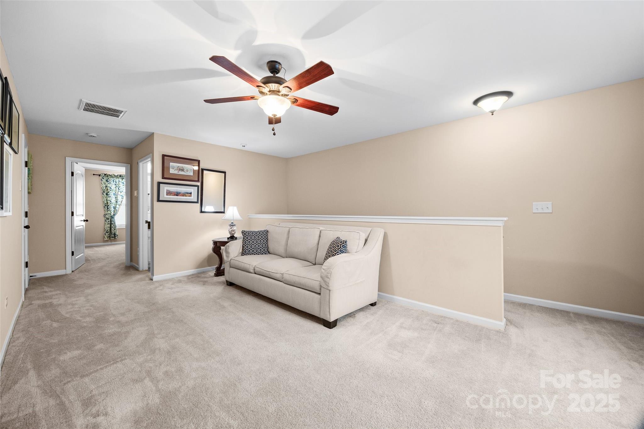 1617 Fig Branch Road Clover, SC 29710 - Photo 24 of 33 a living room with furniture and a chandelier