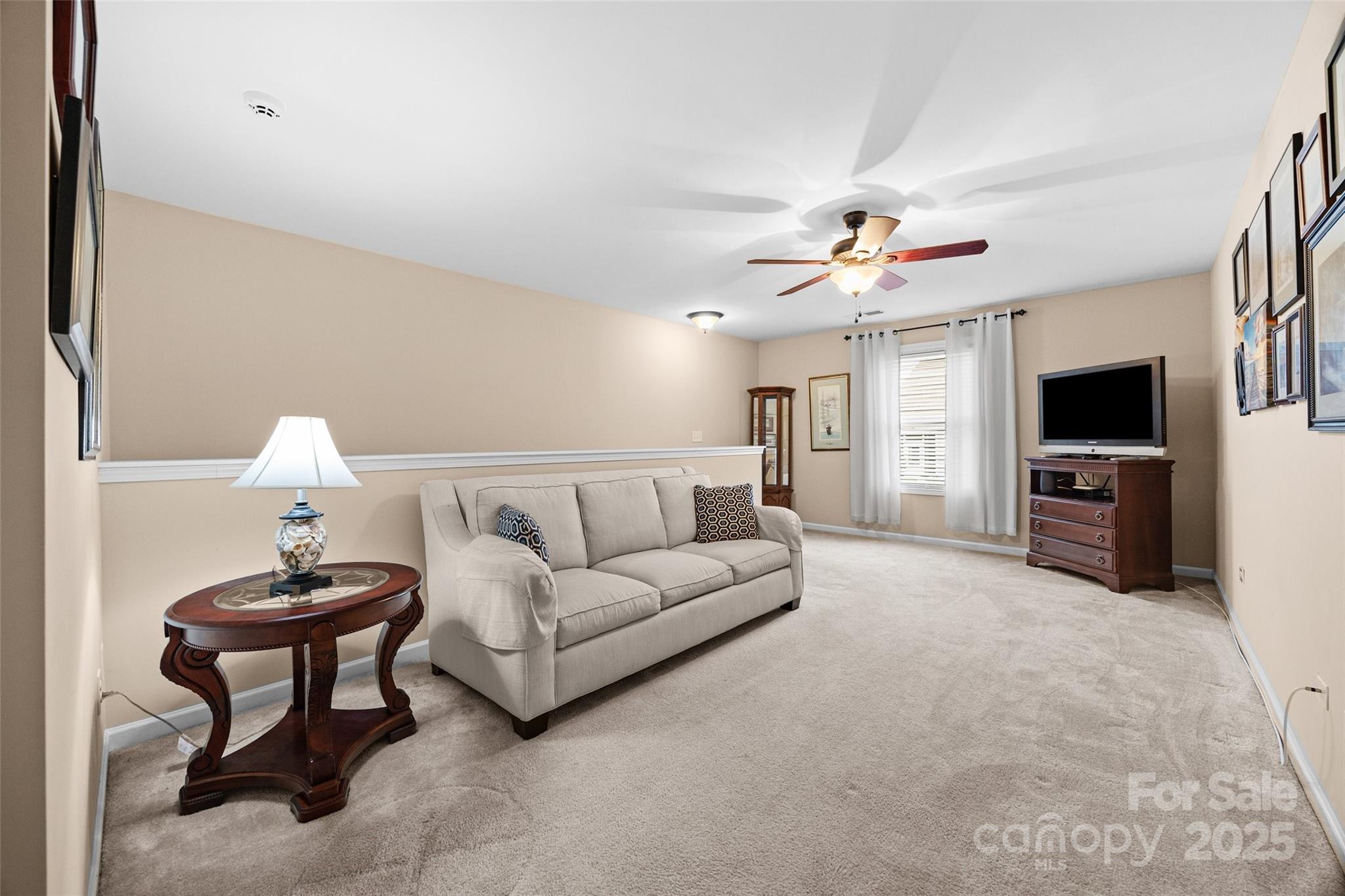 1617 Fig Branch Road Clover, SC 29710 - Photo 25 of 33 a living room with furniture and a flat screen tv