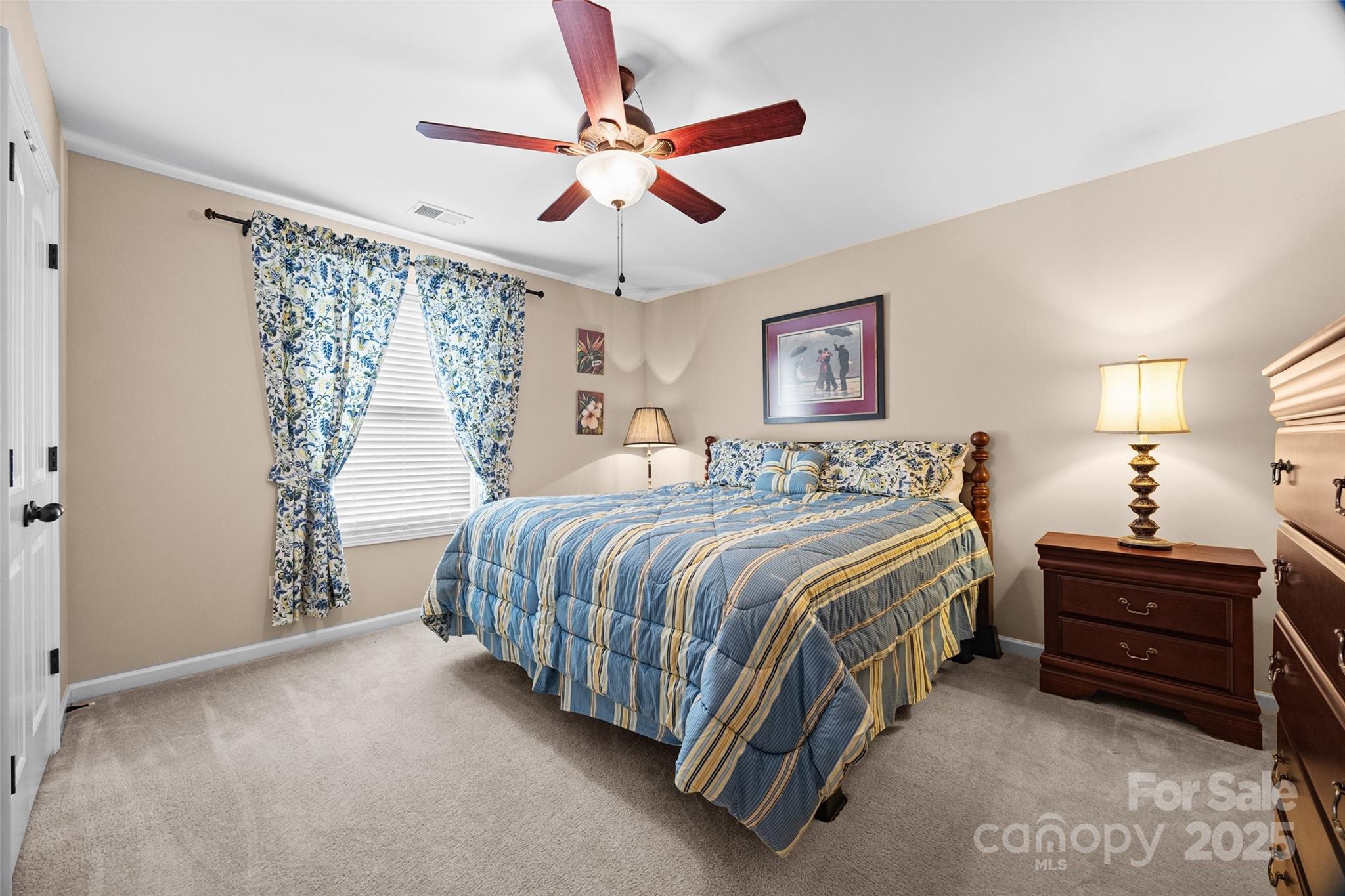 1617 Fig Branch Road Clover, SC 29710 - Photo 26 of 33 a spacious bedroom with a bed and a ceiling fan