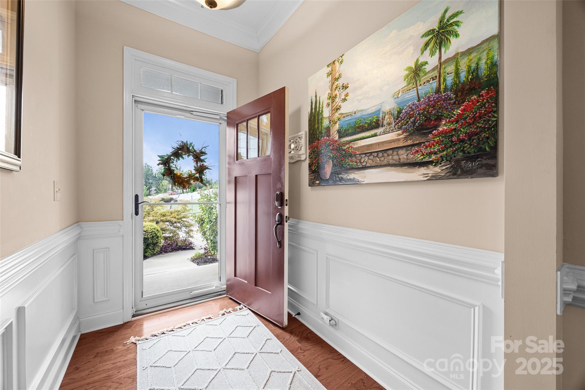 1617 Fig Branch Road Clover, SC 29710 - Photo 3 of 33 a view of a hallway with wooden floor and a living room
