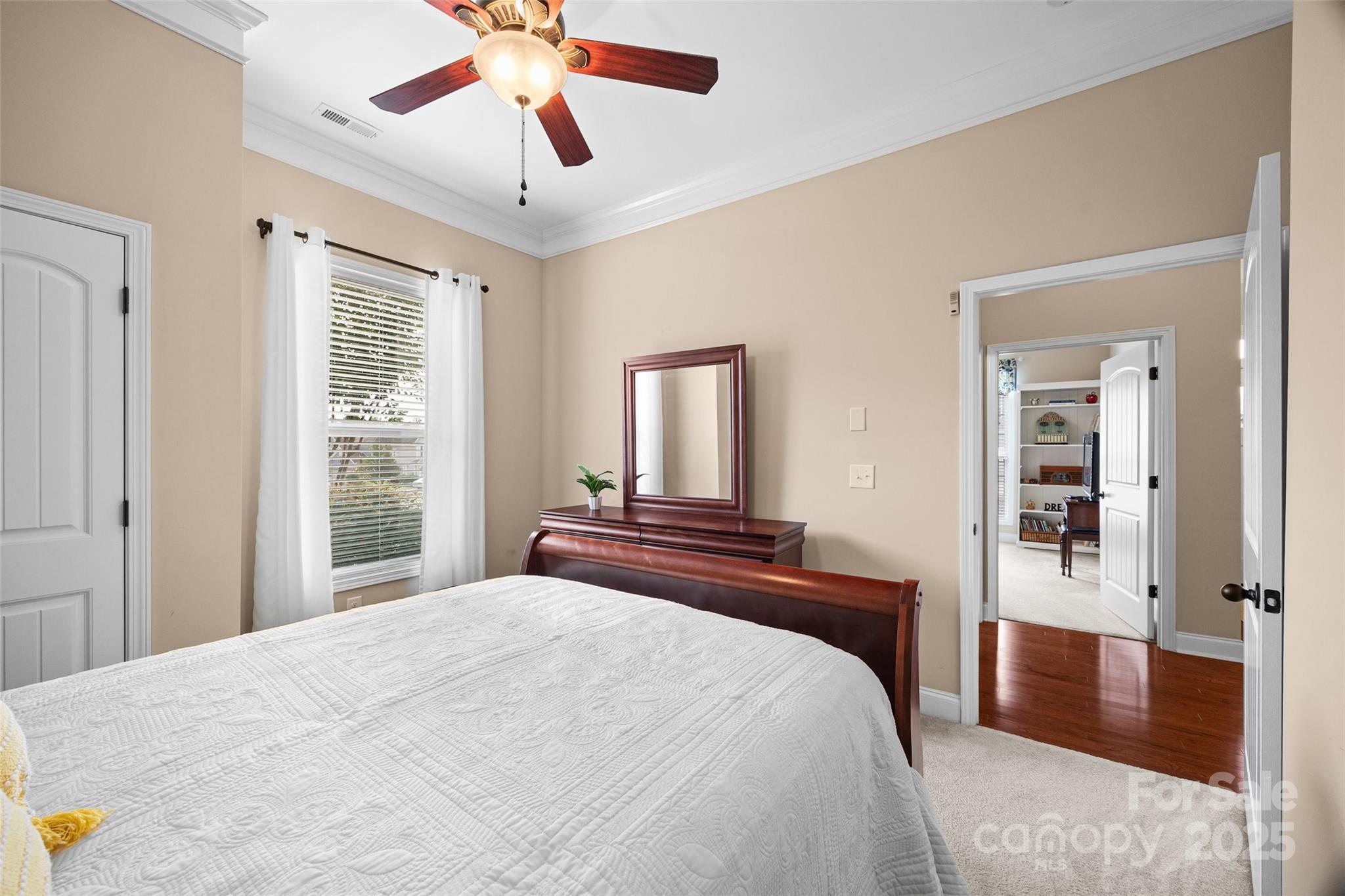 1617 Fig Branch Road Clover, SC 29710 - Photo 7 of 33 a bedroom with a bed and a chandelier