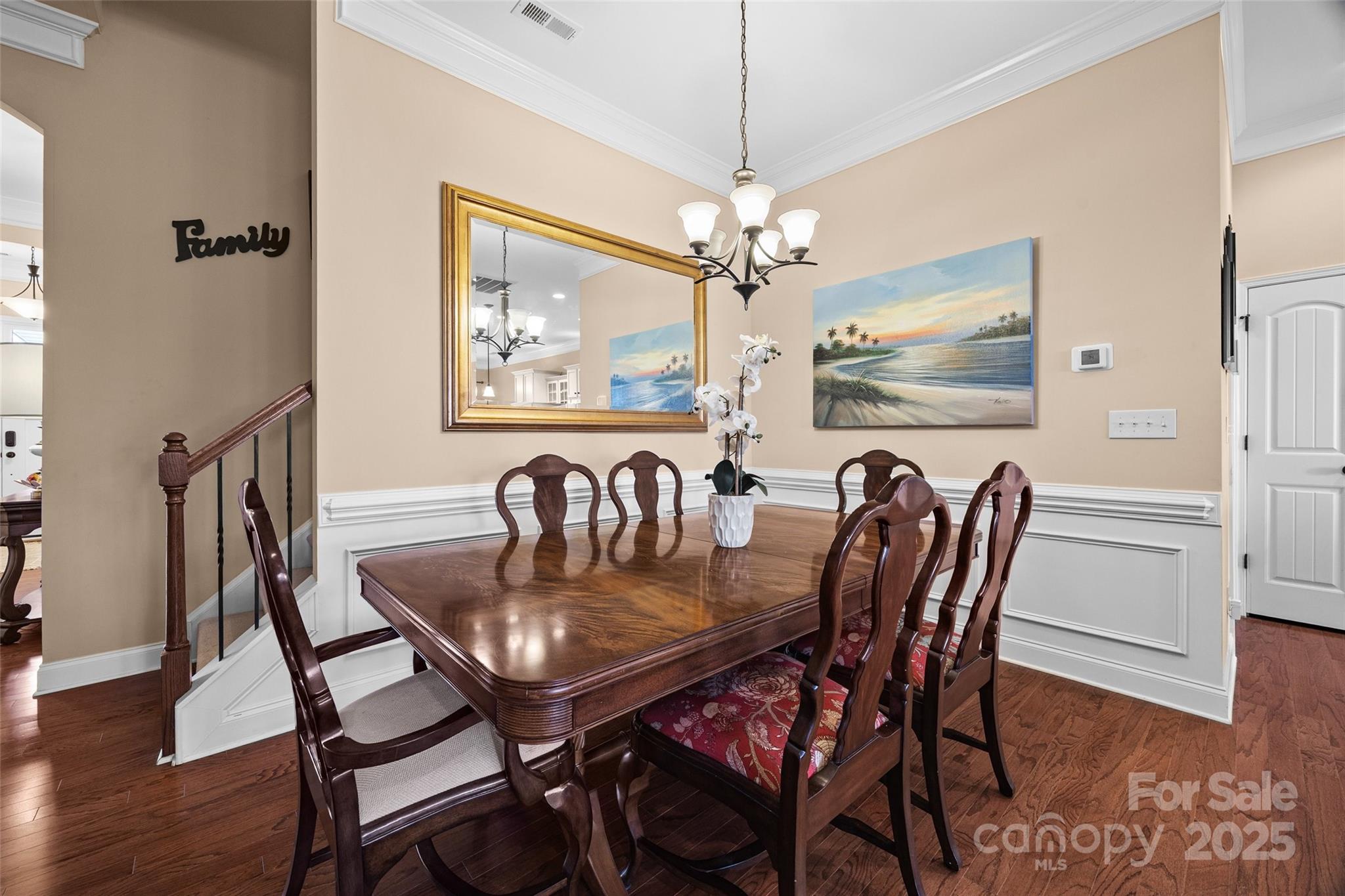 1617 Fig Branch Road Clover, SC 29710 - Photo 9 of 33 a view of a dining room with furniture a chandelier and wooden floor