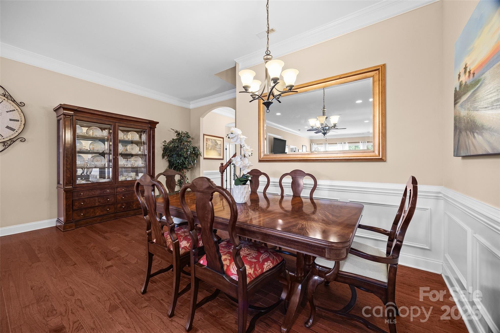 1617 Fig Branch Road Clover, SC 29710 - Photo 10 of 33 a view of a dining room with furniture a chandelier and wooden floor