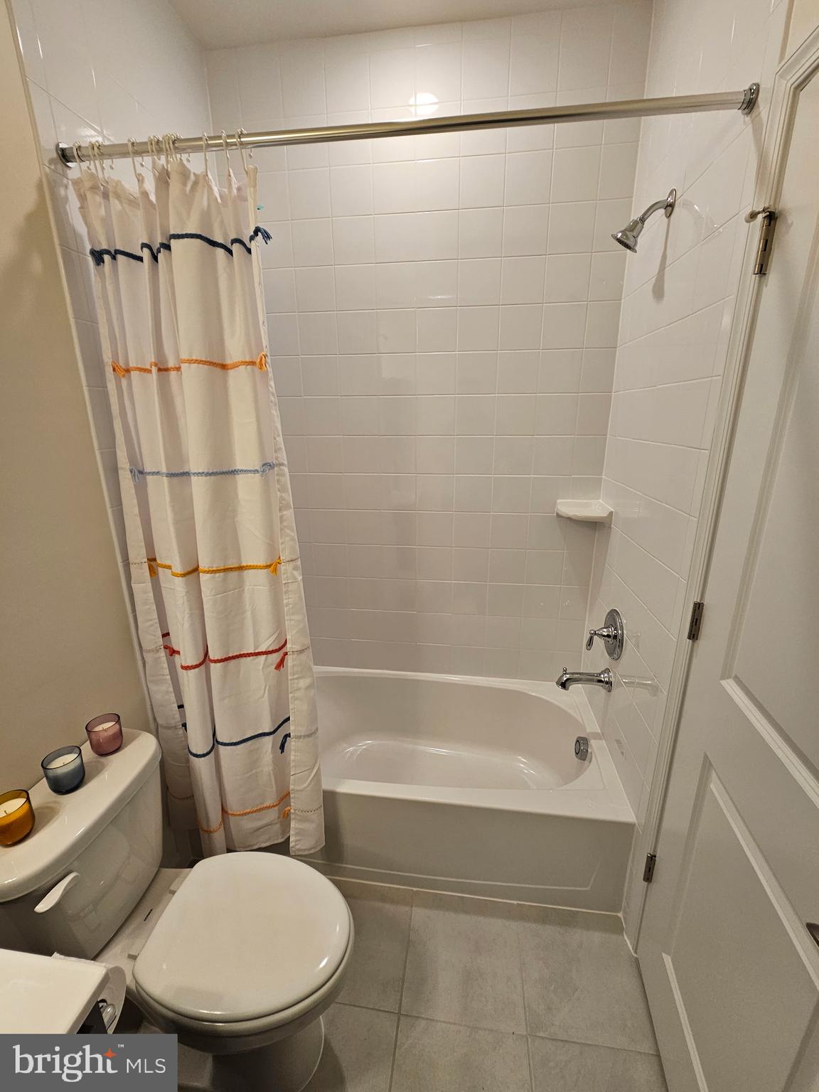 7304 Roxy Run, Unit 8 Clinton, MD 20735 - Photo 11 of 27 a bathroom with a toilet and a bathtub