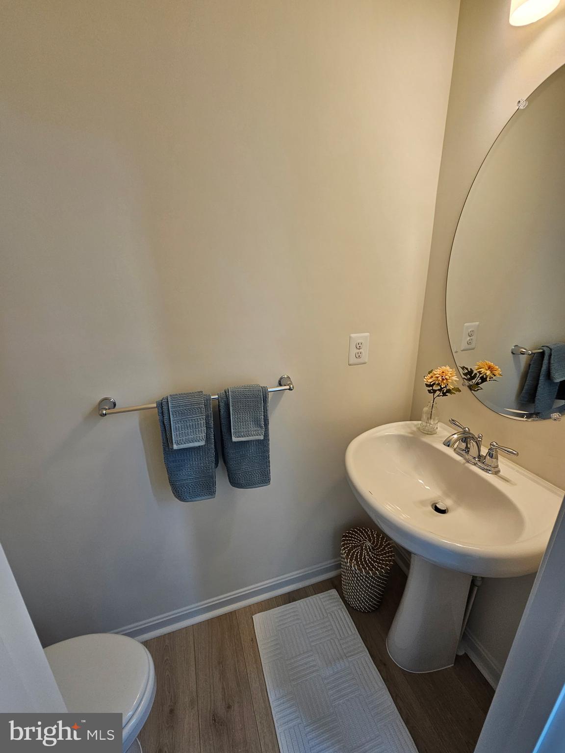 7304 Roxy Run, Unit 8 Clinton, MD 20735 - Photo 15 of 27 a bathroom with a sink toilet and a mirror
