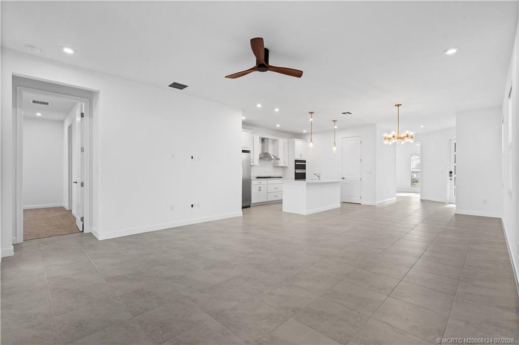 9731 Southwest Indra Way Port St. Lucie, FL 34987 - Photo 13 of 33 Living Room