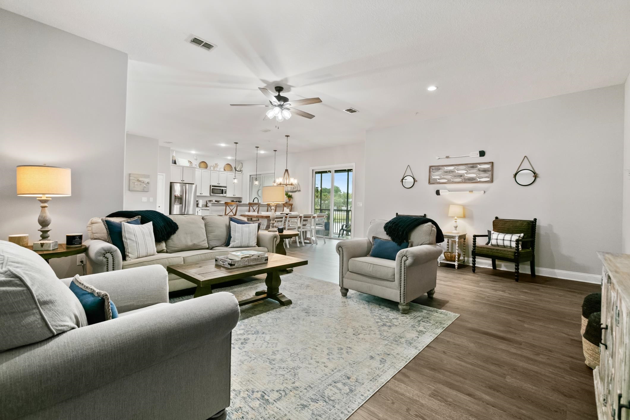 121 Grand Ravine Drive St. Augustine, FL 32086 - Photo 18 of 44 a living room with furniture and a chandelier