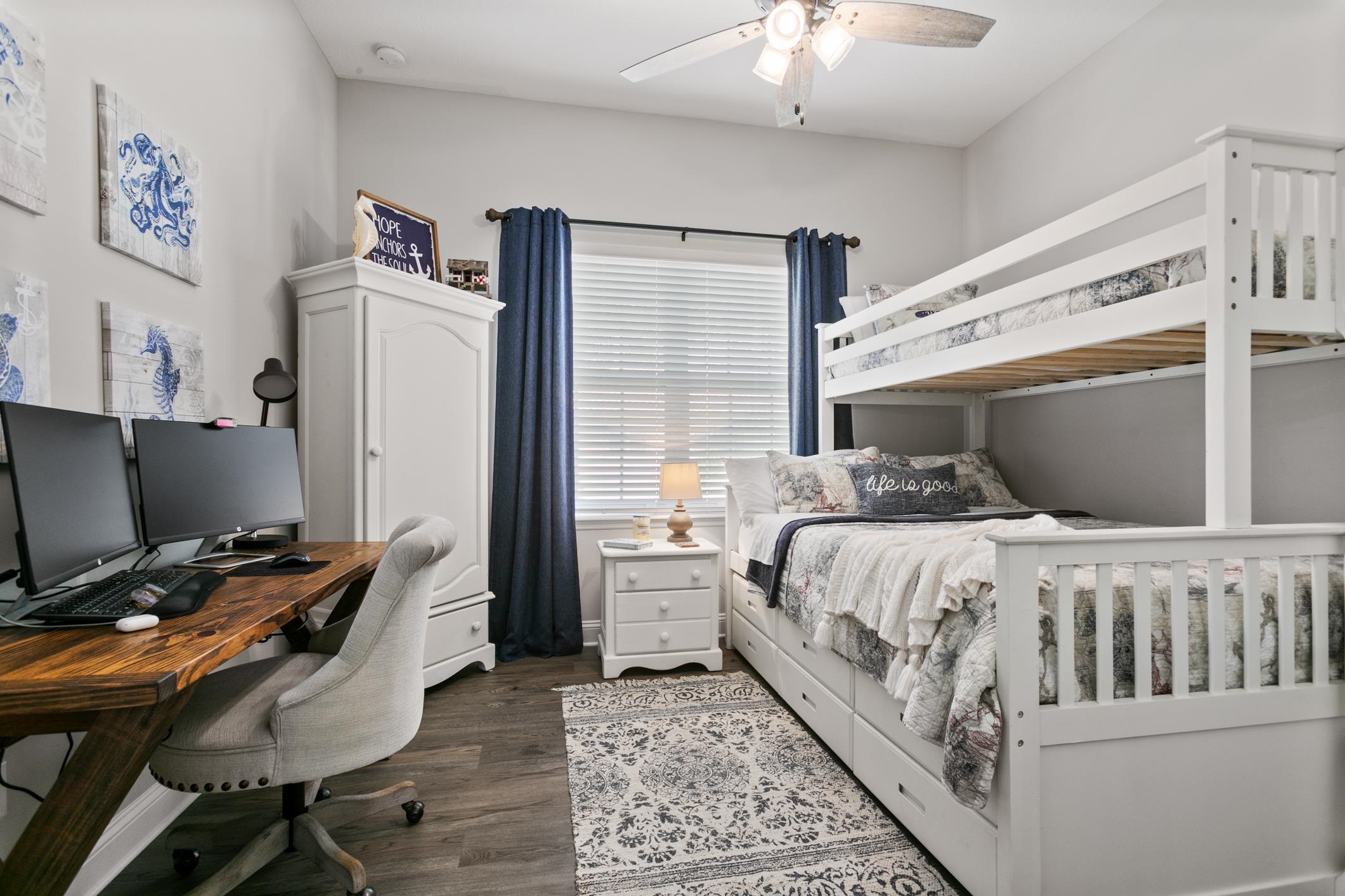 121 Grand Ravine Drive St. Augustine, FL 32086 - Photo 21 of 44 a bedroom with a bed and a desk