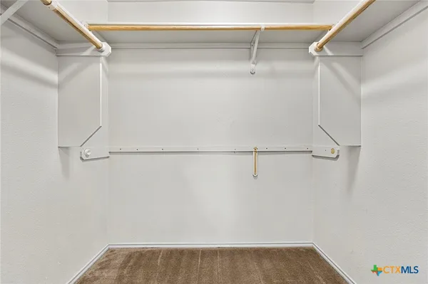 a view of small space with racks on the wall