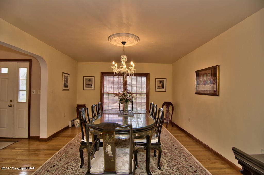307 Rosewood Road Stroudsburg, PA 18360 - Photo 44 of 107 a view of a dining room with furniture and chandelier