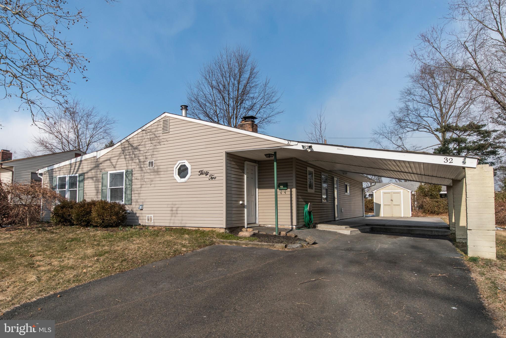 32 Gentle Road Levittown, PA 19057 - Photo 2 of 32 a front view of a house with a yard
