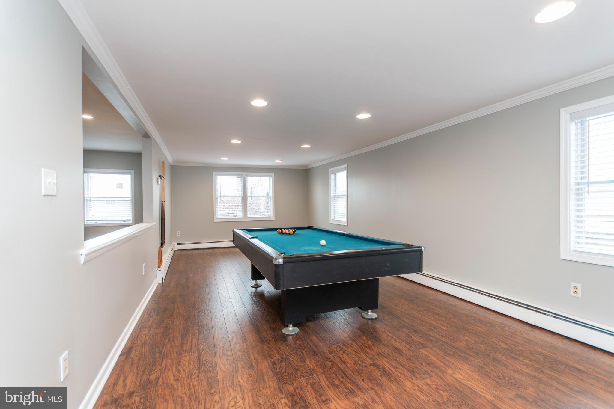32 Gentle Road Levittown, PA 19057 - Photo 13 of 32 a room with wooden floor and window