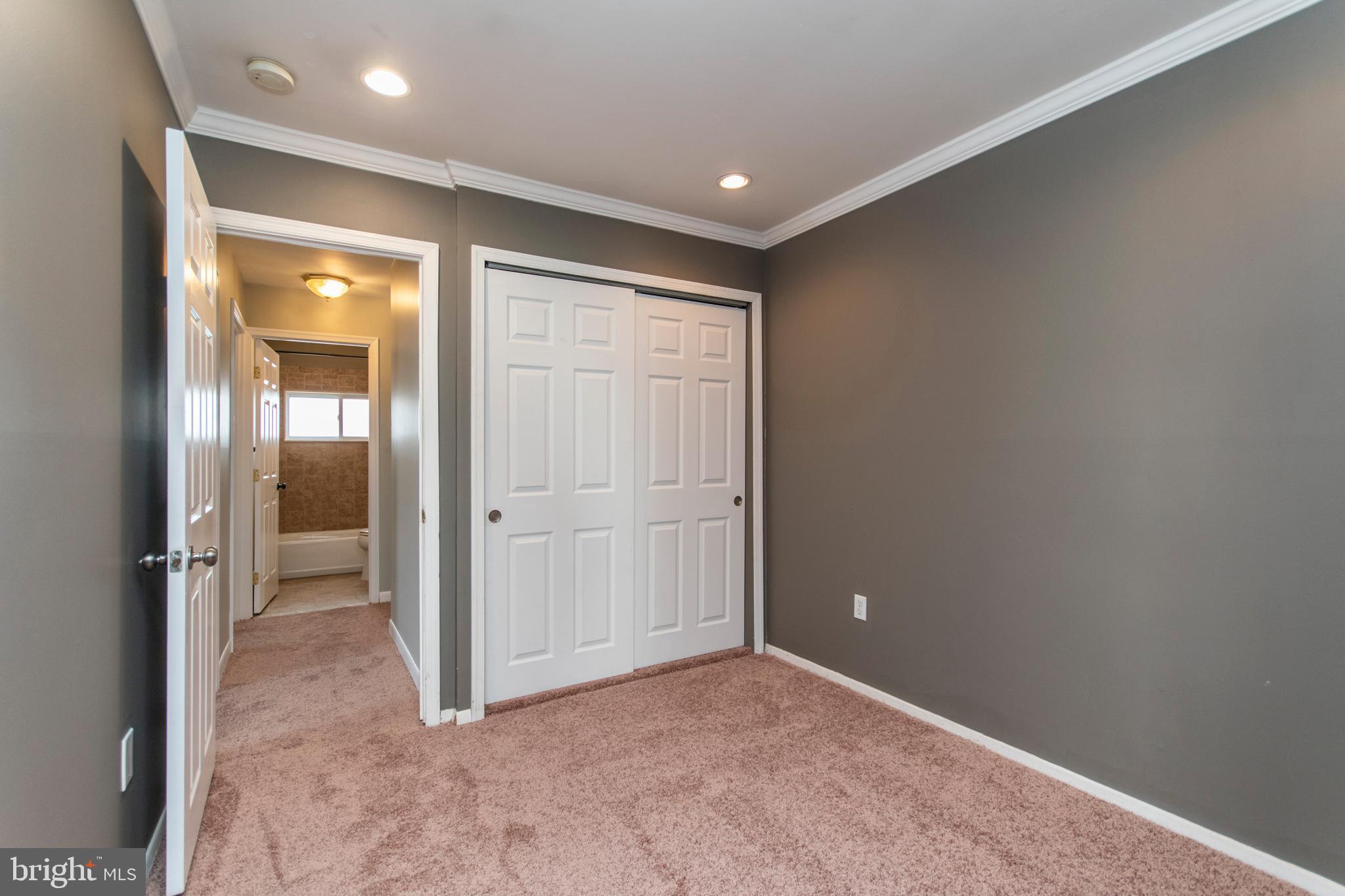 32 Gentle Road Levittown, PA 19057 - Photo 16 of 32 an empty room with closet and a bathroom