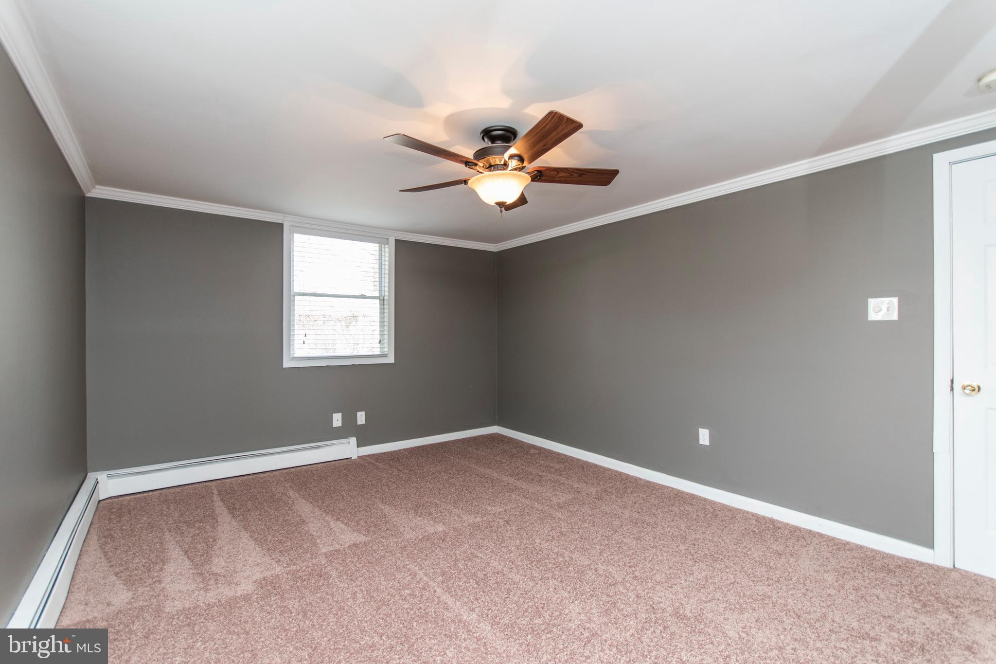 32 Gentle Road Levittown, PA 19057 - Photo 21 of 32 a view of an empty room with a window
