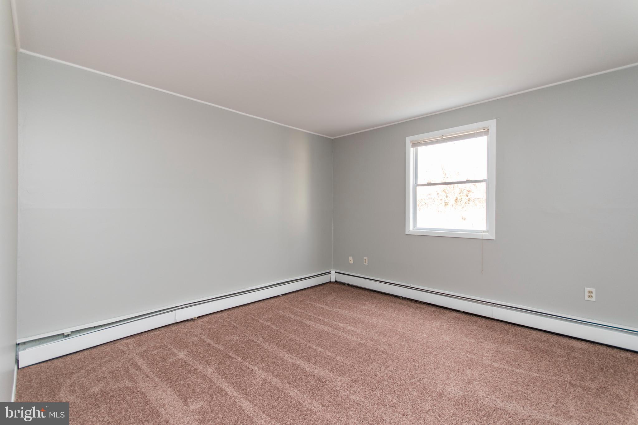 32 Gentle Road Levittown, PA 19057 - Photo 25 of 32 an empty room with a window