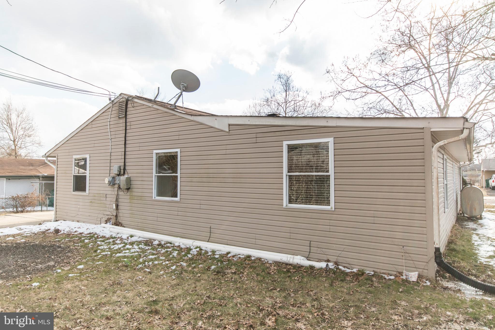 32 Gentle Road Levittown, PA 19057 - Photo 32 of 32 a view of a house with a yard