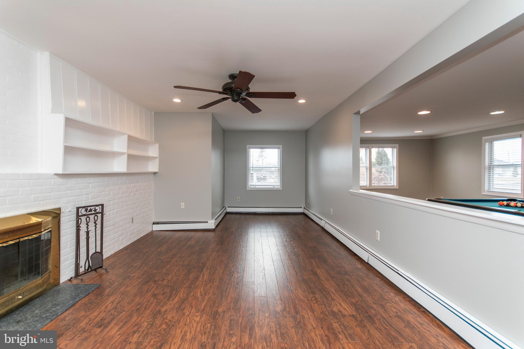 32 Gentle Road Levittown, PA 19057 - Photo 9 of 32 a view of an empty room with wooden floor and a window