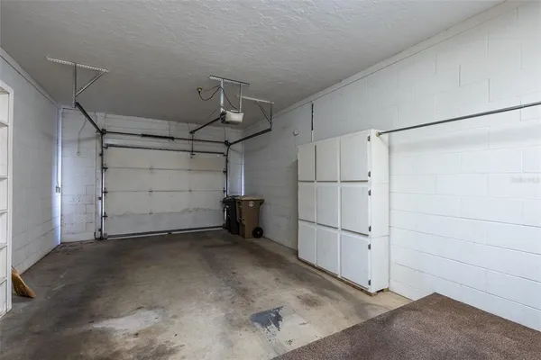a view of a storage & utility room with a sink