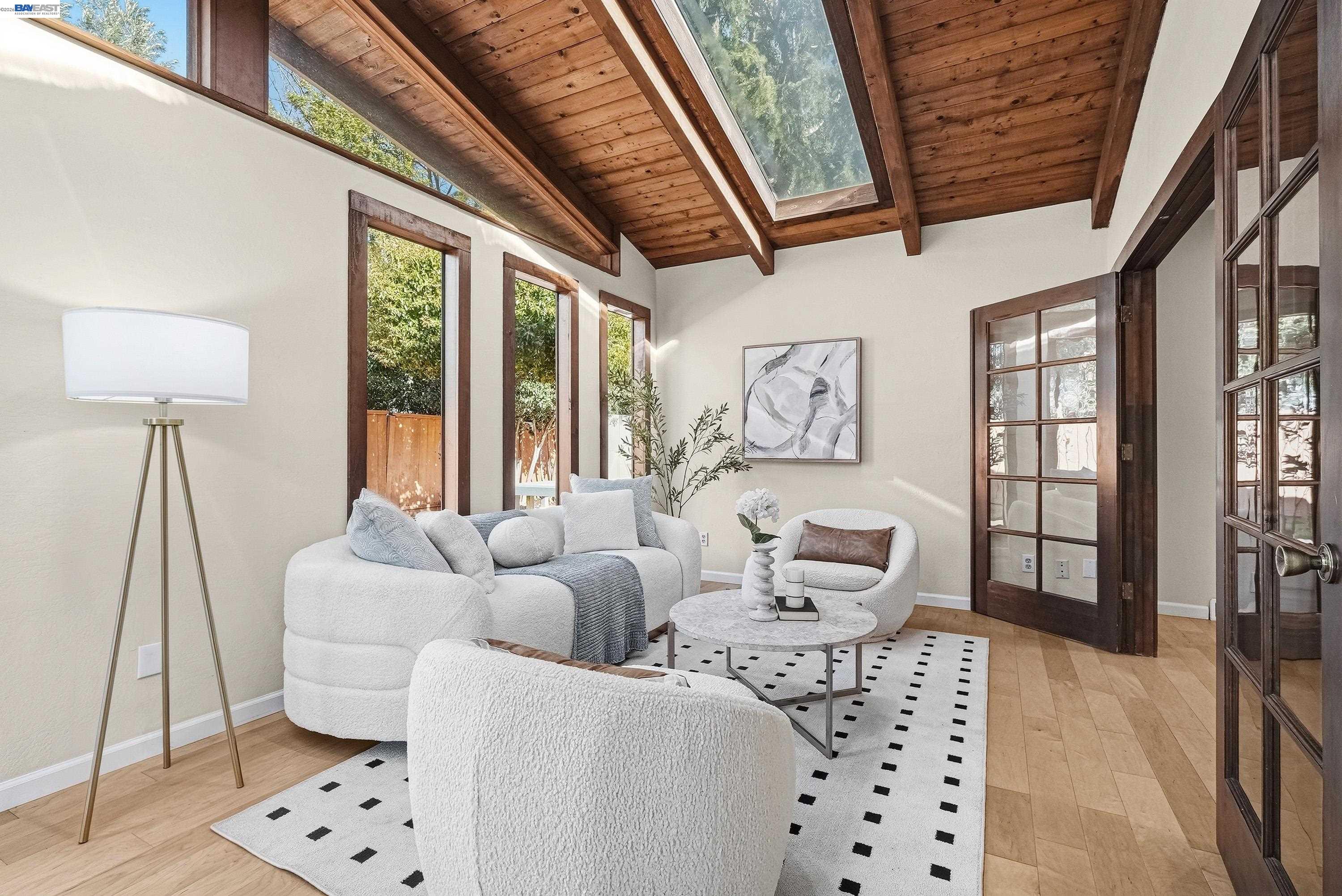 1621 Harvest Road Pleasanton, CA 94566 - Photo 23 of 52 a living room with furniture and a large window