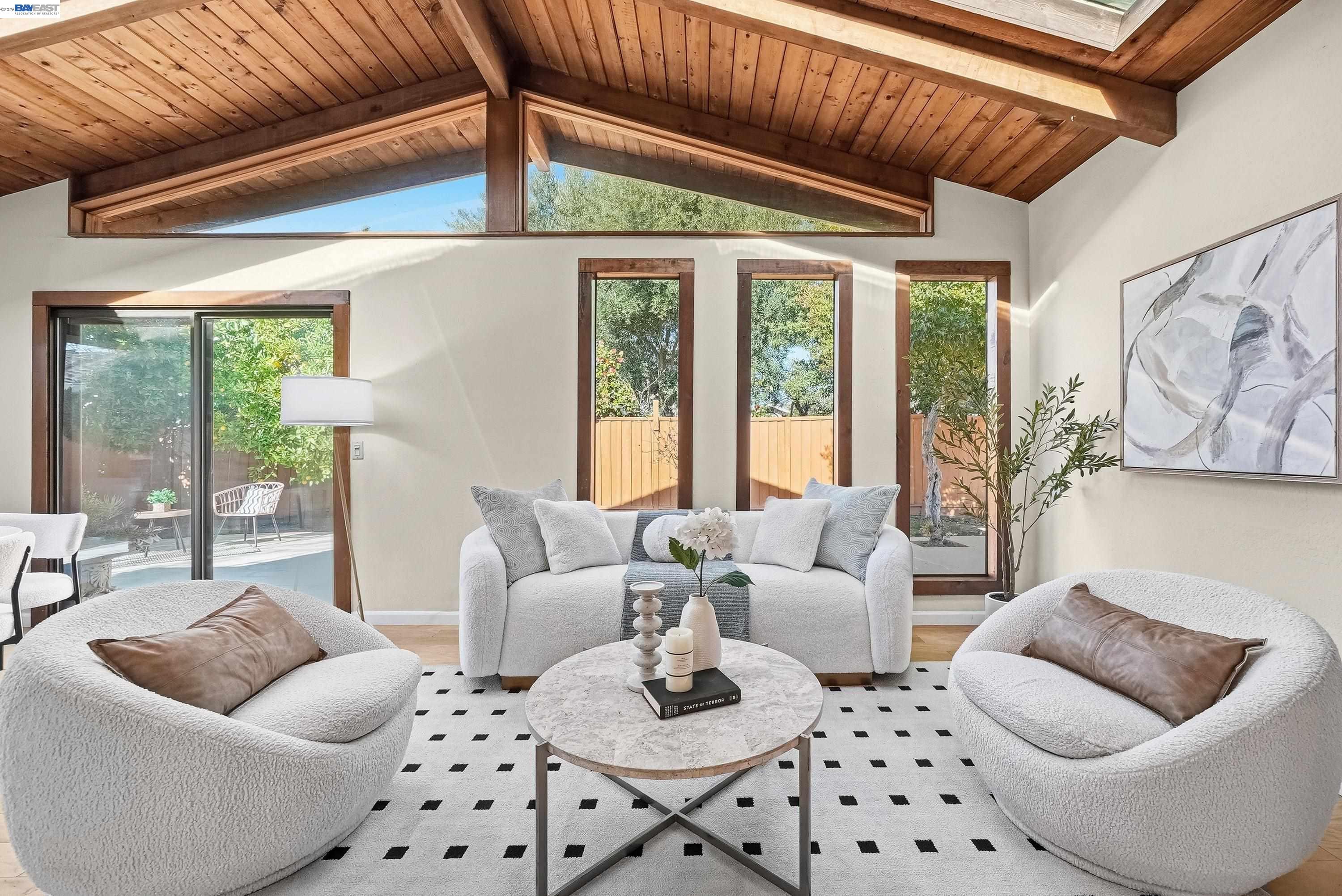 1621 Harvest Road Pleasanton, CA 94566 - Photo 25 of 52 a living room with furniture and a large window