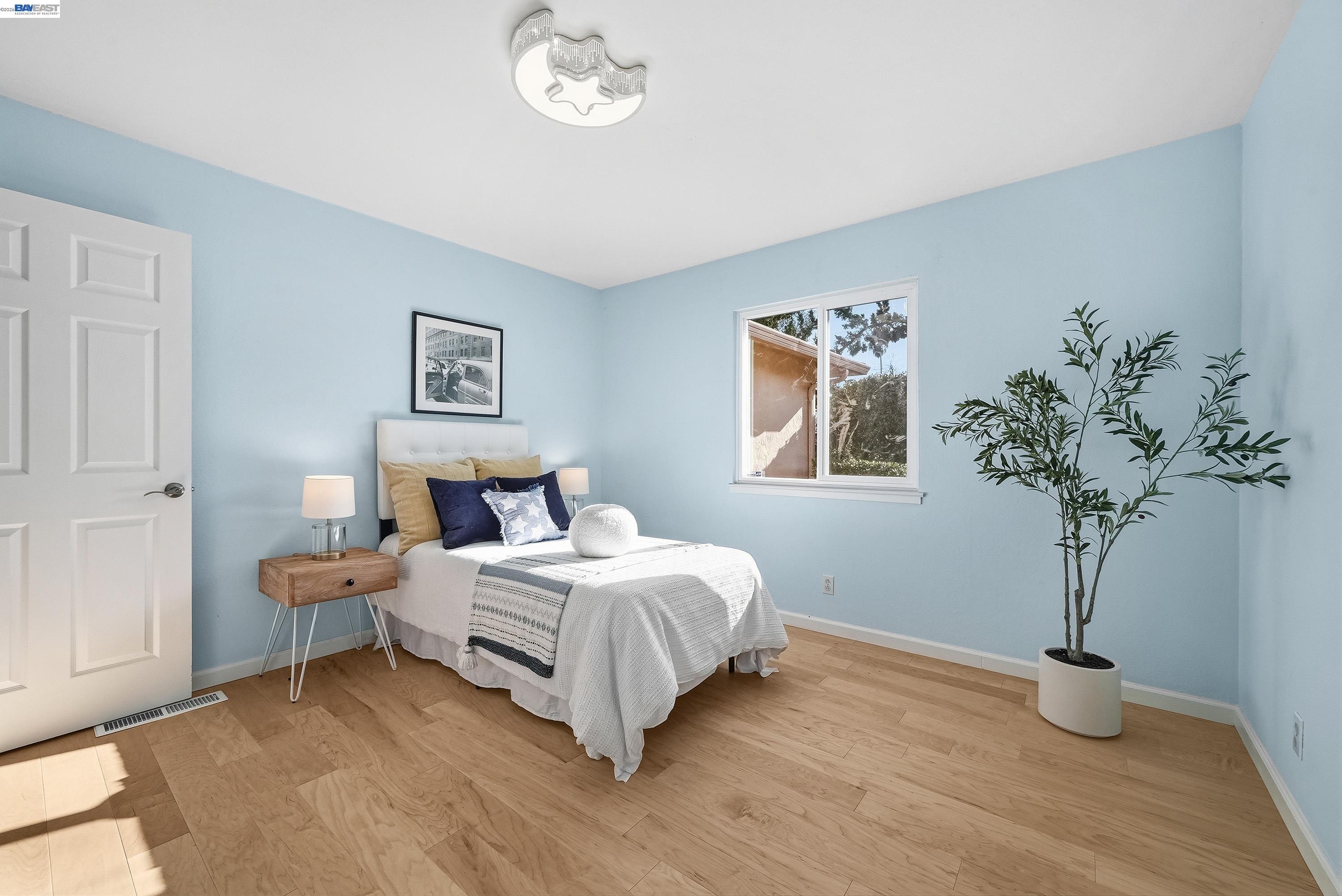 1621 Harvest Road Pleasanton, CA 94566 - Photo 39 of 52 a bedroom with a bed and a window