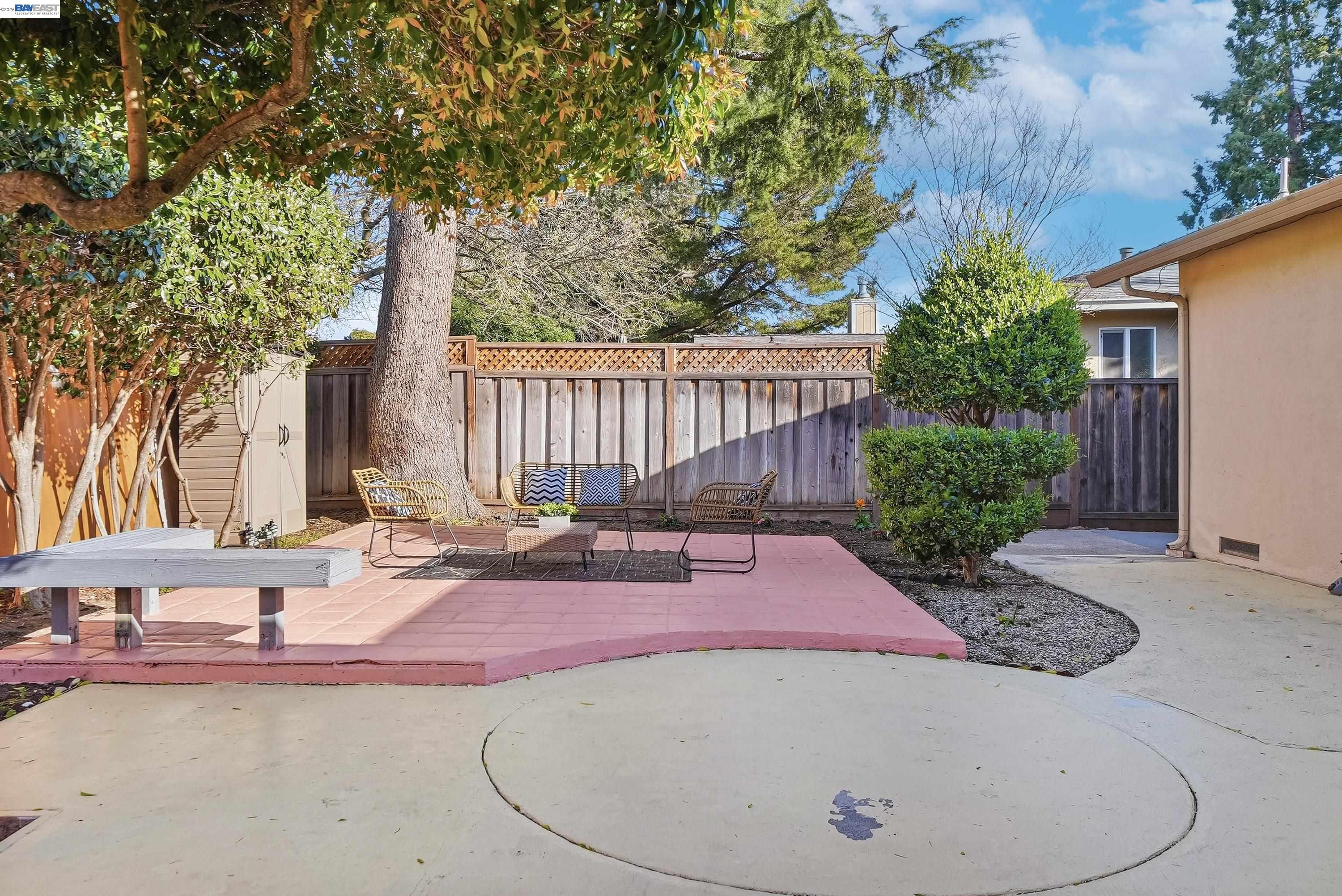 1621 Harvest Road Pleasanton, CA 94566 - Photo 45 of 52 a view of a backyard with plants and tree