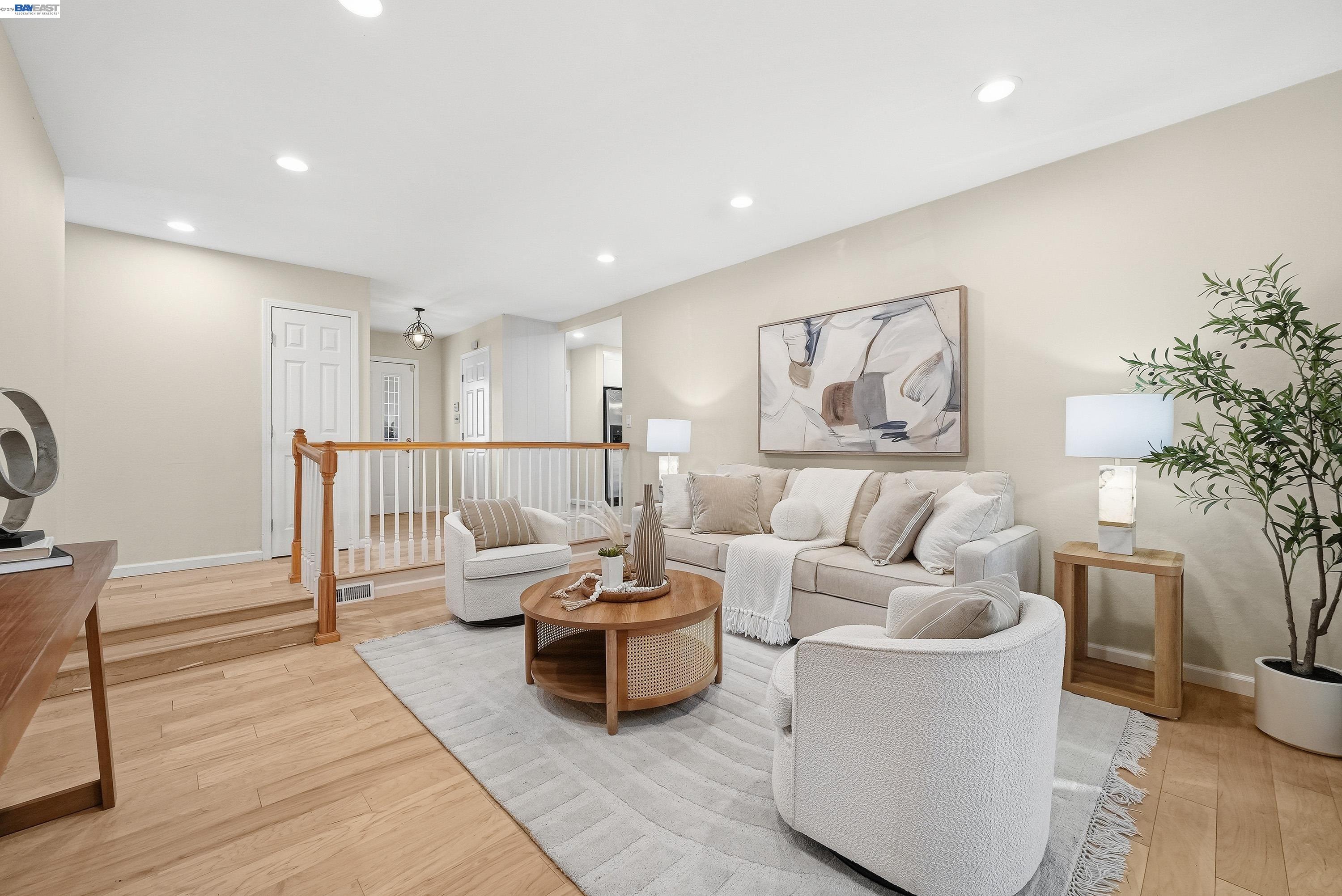 1621 Harvest Road Pleasanton, CA 94566 - Photo 7 of 52 a living room with furniture and a potted plant