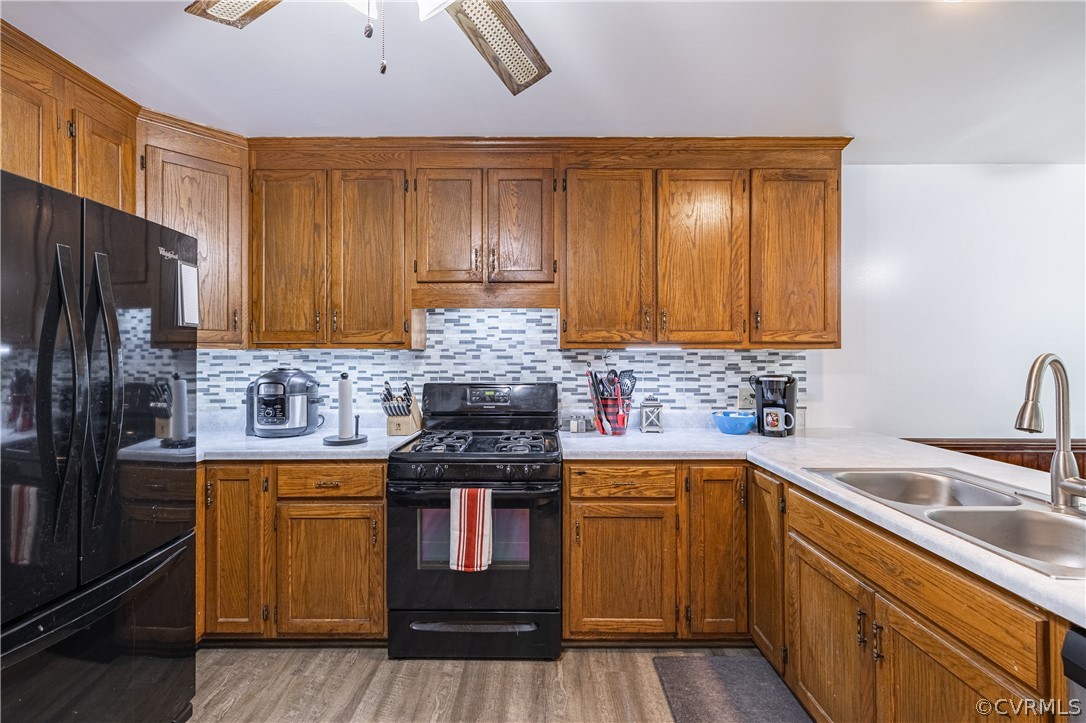 8090 Hungarytown Road Crewe, VA 23930 - Photo 20 of 47 a kitchen with stainless steel appliances granite countertop a sink stove and refrigerator