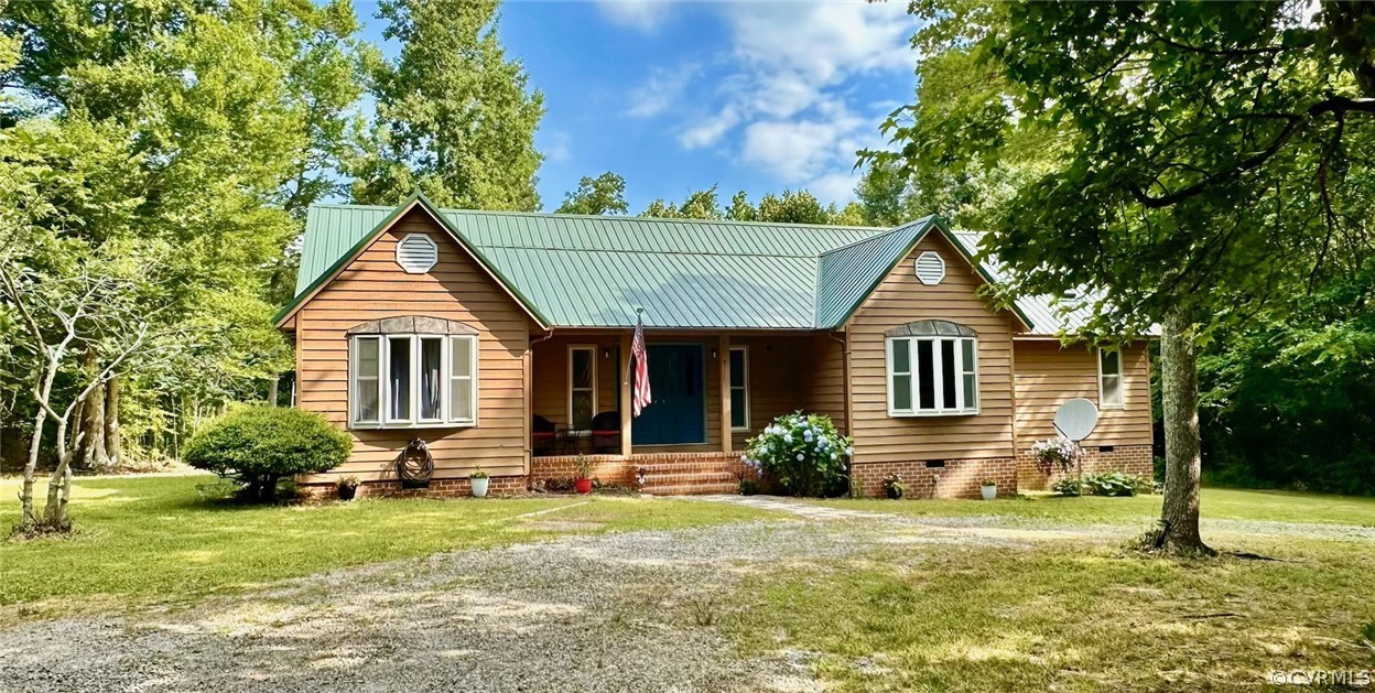 8090 Hungarytown Road Crewe, VA 23930 - Photo 2 of 47 a front view of a house with garden