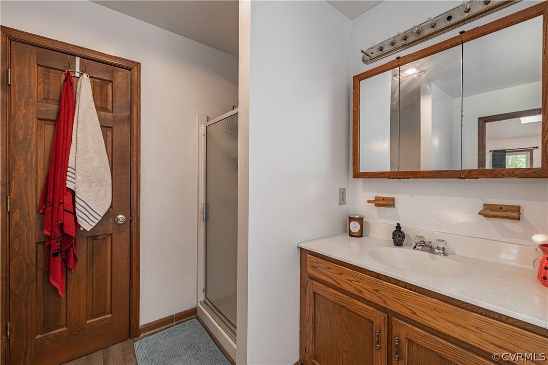 8090 Hungarytown Road Crewe, VA 23930 - Photo 26 of 47 a bathroom with a sink and a mirror