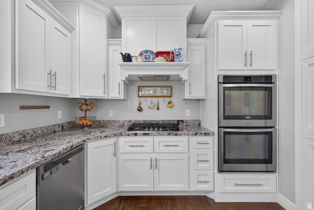 1263 East 1200th South Springville, UT 84663 - Photo 11 of 60 Kitchen featuring white cabinetry, granite countertops, stainless steel appliances, a built-in gas cooktop, and a double wall oven