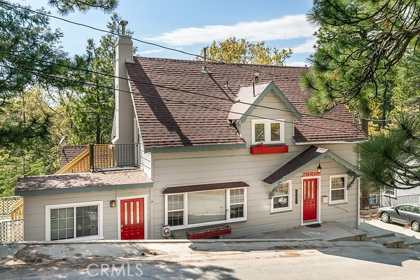 2726 View Drive Running Springs, CA 92382 - Photo 1 of 17 front view of a house with a street