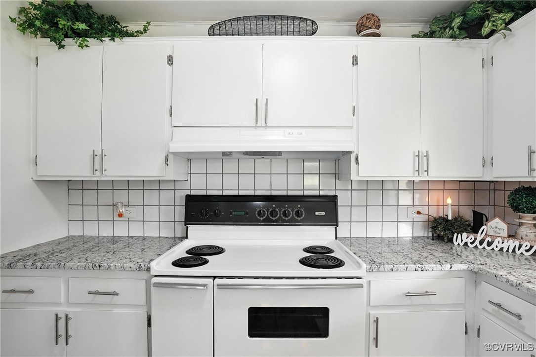 1822 Baughan Road Meherrin, VA 23954 - Photo 14 of 50 a stove top oven sitting inside of a kitchen