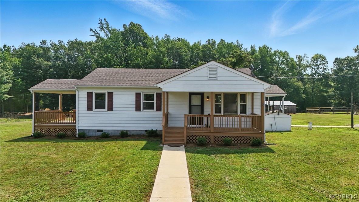 1822 Baughan Road Meherrin, VA 23954 - Photo 2 of 50 a front view of a house with a yard