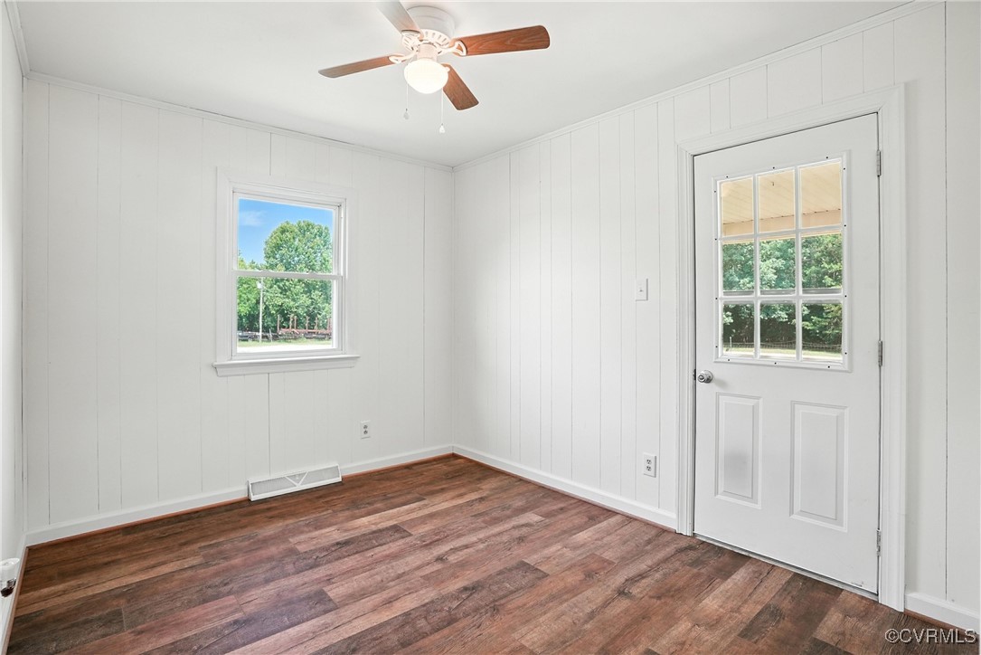 1822 Baughan Road Meherrin, VA 23954 - Photo 24 of 50 a view of empty room with wooden floor and fan
