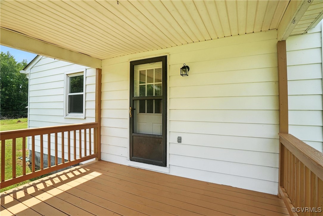 1822 Baughan Road Meherrin, VA 23954 - Photo 27 of 50 a view of a balcony with wooden floor