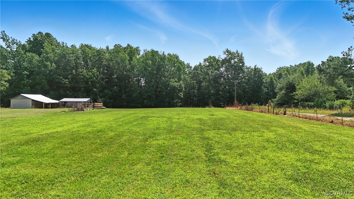 1822 Baughan Road Meherrin, VA 23954 - Photo 30 of 50 a view of a garden and basketball court