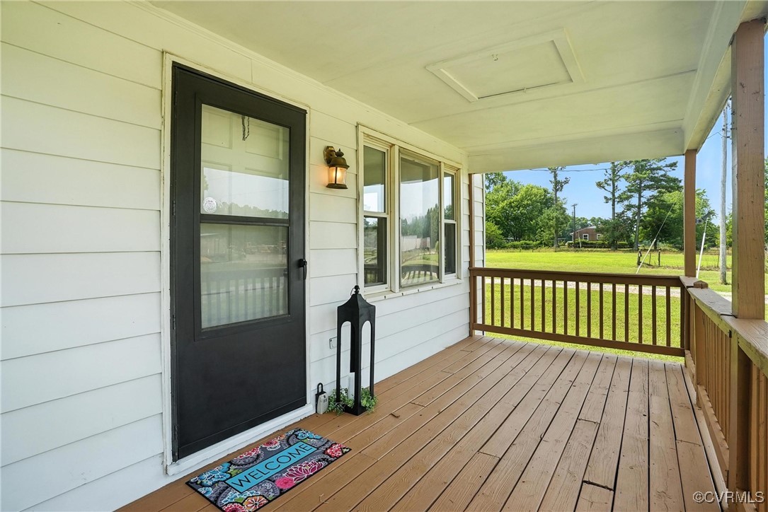 1822 Baughan Road Meherrin, VA 23954 - Photo 3 of 50 a view of a balcony with wooden floor
