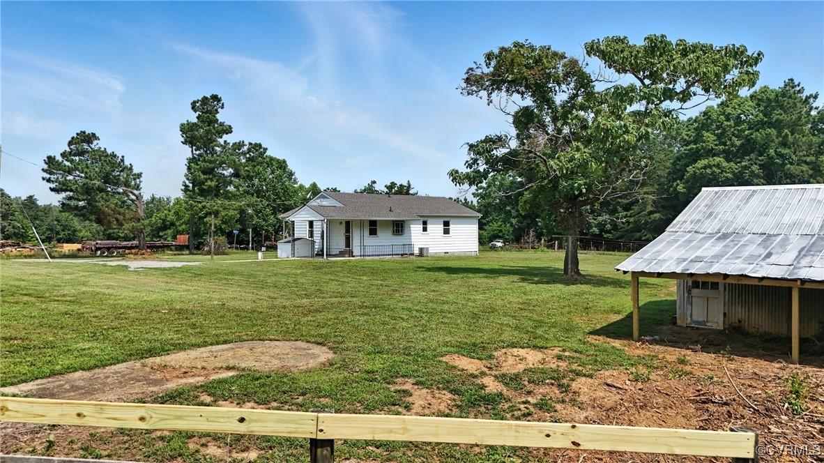 1822 Baughan Road Meherrin, VA 23954 - Photo 37 of 50 a front view of a house with garden