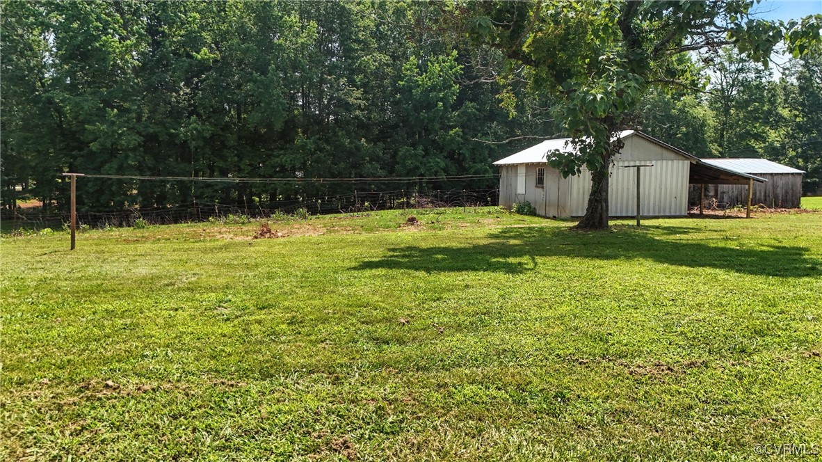 1822 Baughan Road Meherrin, VA 23954 - Photo 50 of 50 a backyard of a house with lots of green space