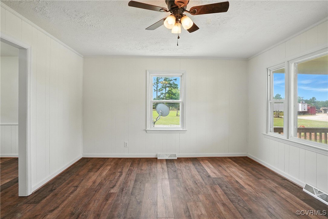 1822 Baughan Road Meherrin, VA 23954 - Photo 7 of 50 wooden floor in an empty room with a window