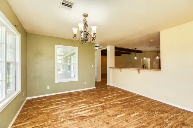 a view of a bedroom with a natural light