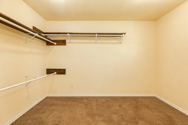 a view of a room with racks on the wall