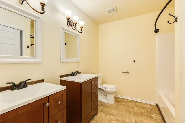 a bathroom with a sink and a toilet