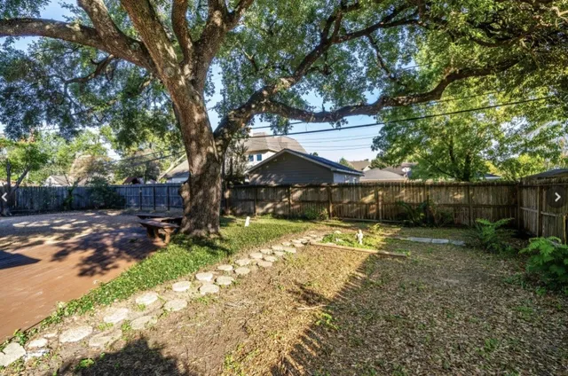 a house with trees in front of it