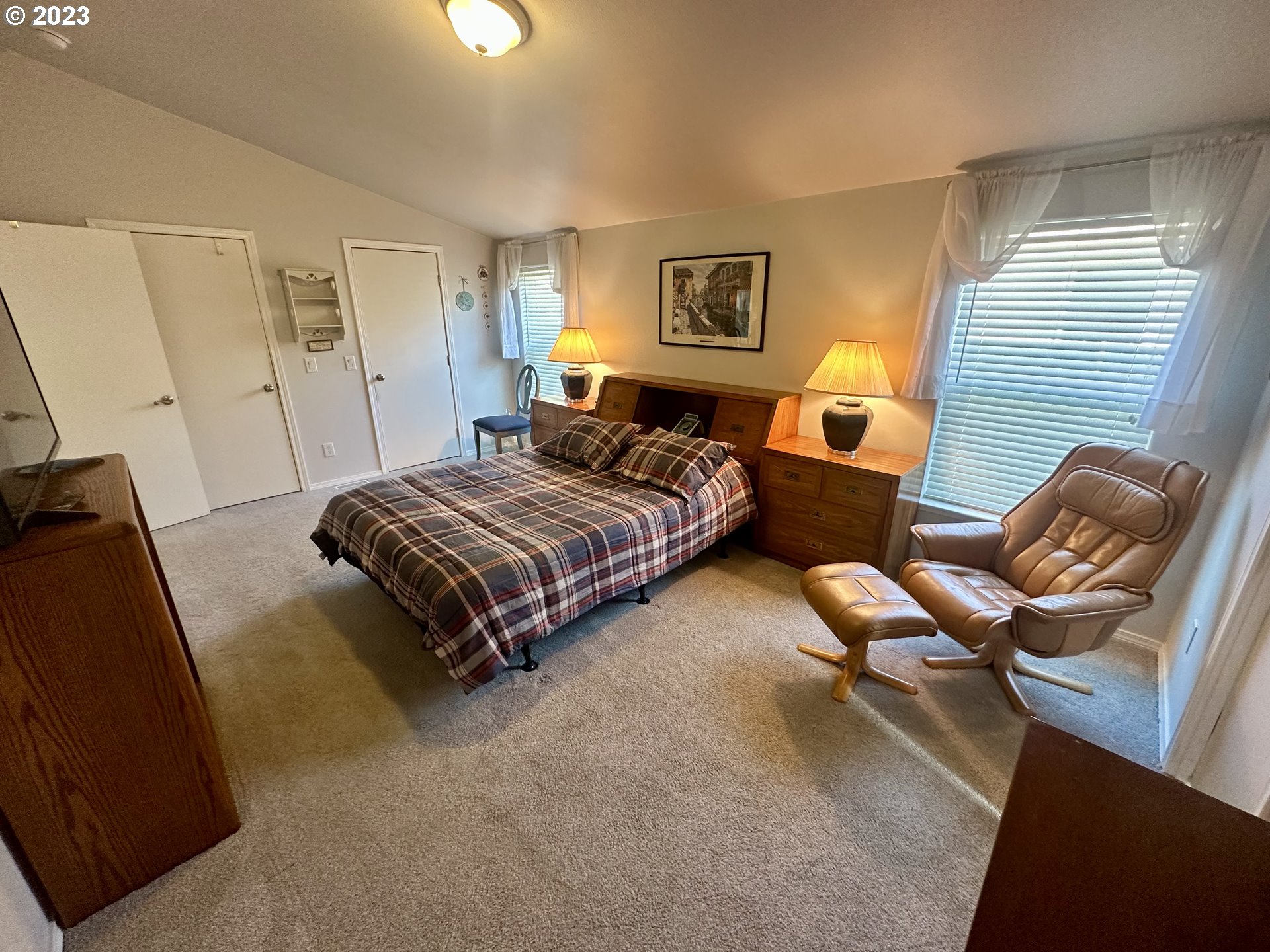 5275 Bridgewater Drive Eugene, OR 97402 - Photo 11 of 18 a spacious bedroom with a bed and furniture