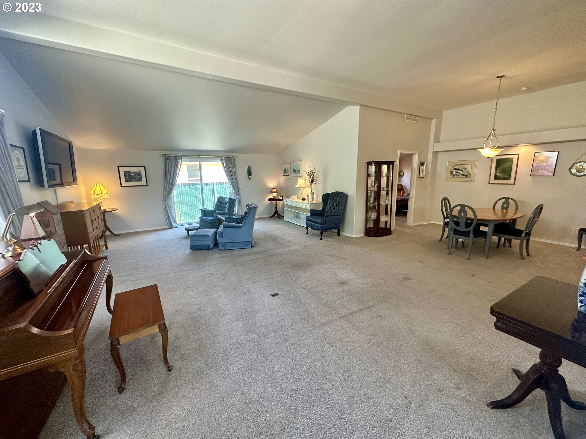 5275 Bridgewater Drive Eugene, OR 97402 - Photo 5 of 18 a living room with furniture and a window