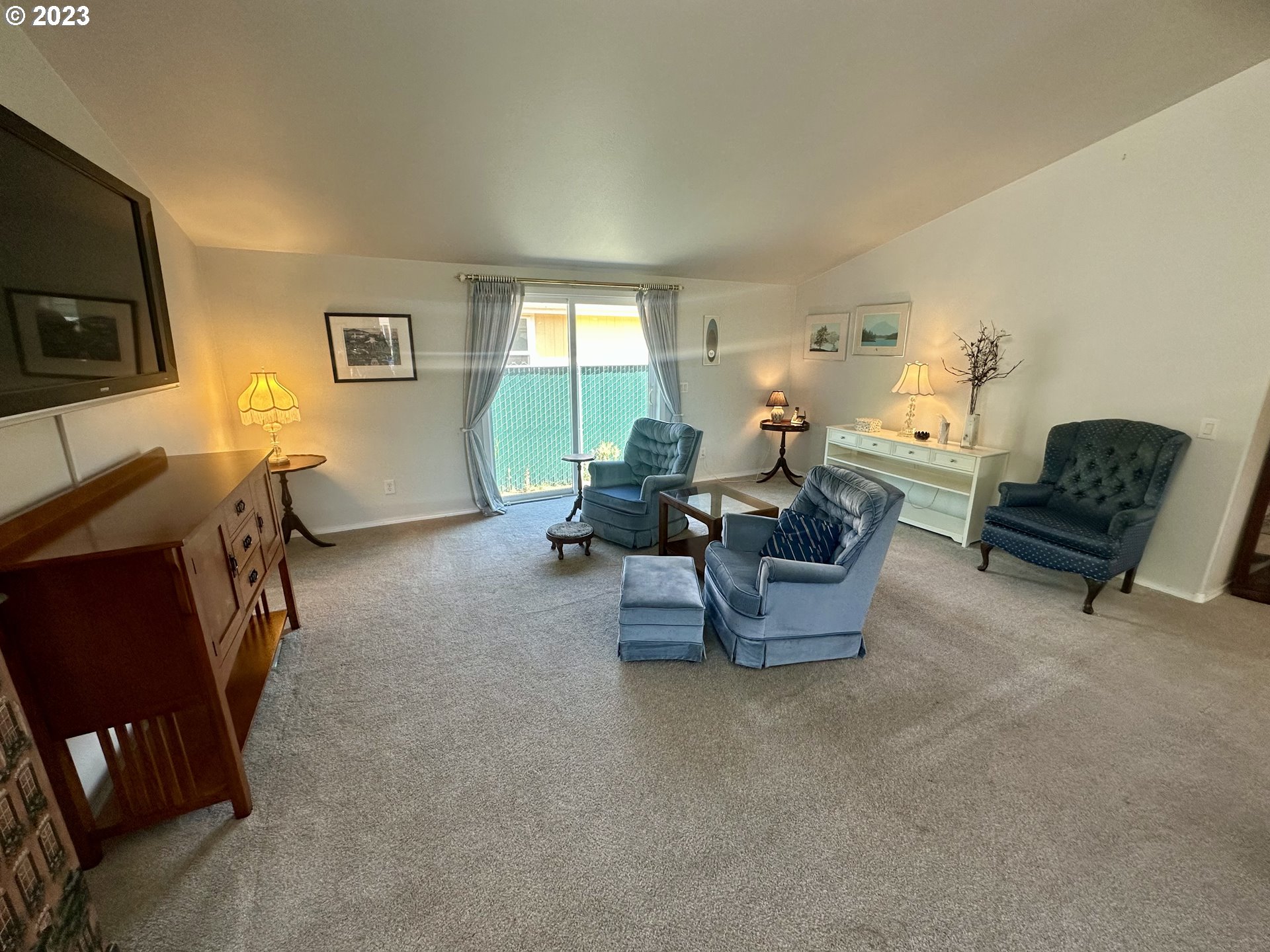 5275 Bridgewater Drive Eugene, OR 97402 - Photo 6 of 18 a living room with furniture and a window