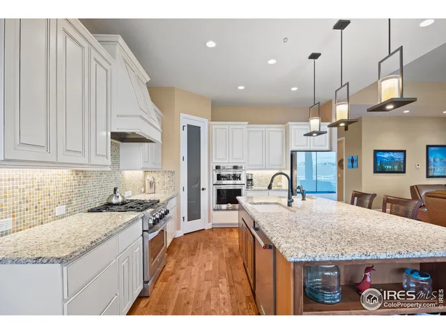 a kitchen with granite countertop lots of counter top space